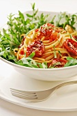 Delicious fresh pasta with balsamico marinated and dried tomatoes