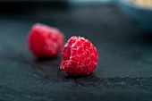 Two frozen raspberries