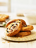 Raisin whirls on a wooden plate