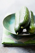 Three cucumbers on a plate