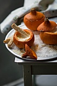 Cream of pumpkin soup in hollowed-out Hokkaido pumpkins