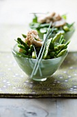 Lukewarm vegetable salad with green beans, peas and asparagus