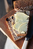 Honey and pecan nut bread spread with butter