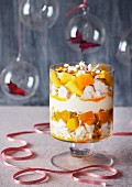 A trifle made with passion fruit, mango, meringue and custard cream