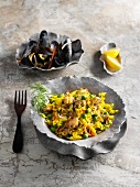 Saffron rice salad with mussels and vegetables