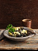 Lentil salad with artichoke hearts and black olives