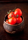 Fresh Cherry Tomatoes in a Small Brown Clay Bowl