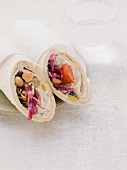 Wraps filled with houmous and tomatoes