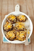 Stuffed mushrooms with bacon, breadcrumbs, parsley and quail's eggs