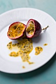 Hollowed-out passion fruit halves with passion fruit flesh