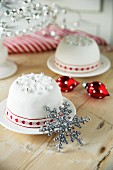 Christmas puddings covered in white icing