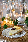 A slice of pear and ginger cheesecake with star anise