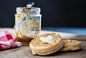Crumpets with butter and marmalade