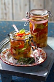 Pickled peppers in preserving jars