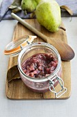 Pear and plum compote in a jar