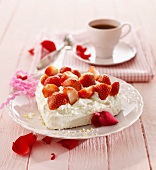 A heart-shaped meringue topped with strawberries