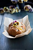 Plaited pear loaf with pansies
