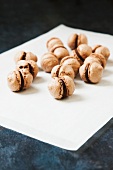 Mini Chocolate Macaroons on Wax Paper