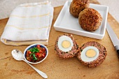 Scotch eggs with pepper relish