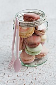 Assorted macaroons in a jar