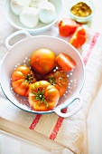 Fresh tomatoes in a colander