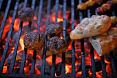 Meatballs and flatbread on the barbecue