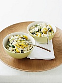 Rice with sliced yellow and green courgettes