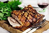 Roast pork with crackling, with a glass of red wine