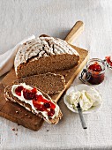 Wholemeal bread with curd cheese and jam