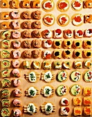Lots of different canapés in rows