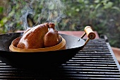 Smoked chicken in a wok