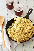 Macaroni and Cheese Made with Cremont Cheese, Onion and Parmesan Topped with Panko Cooked in a Cast Iron Skillet