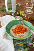 Cream of turnip soup with strips of carrot