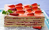 A square strawberry layer cake