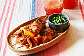 Marinated pork and pineapple kebabs on a bed of rice
