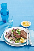 Steaks with bean salad