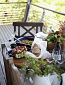 Table set with starters on balcony