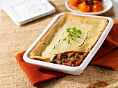 Beef ragout with a pastry lid