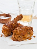 Breaded chicken legs with salt and beer