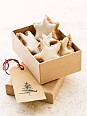Star-shaped cinnamon biscuits in a box as a gift