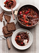 Beef goulash with sour cream and wholemeal bread