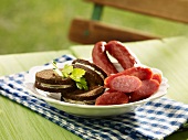 Pumpernickel sandwiches with cabanossi sausage