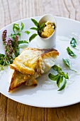 Fried cod fillets with polenta