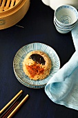 Steamed sticky rice with mushrooms and spicy sauce