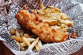 Fish and Chips with Lemon on Newspaper