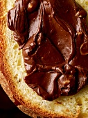 A slice of bread with chocolate hazelnut spread