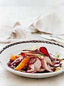 Beetroot carpaccio with sea bass, oranges, fennel and red endive