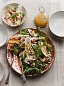 Cheese salad with pears, chicory, hazelnuts and pomegranate seeds