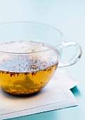 Hot tea in a glass mug