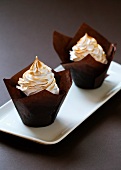 Chocolate muffins with meringue on the top